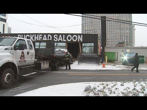 As icy roads cause dangerous conditions, driver loses control, crashes into Buckhead Saloon