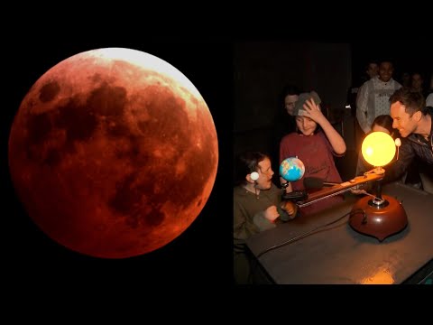 Enthusiasts gather to watch the ‘blood moon.’ See what it looks like