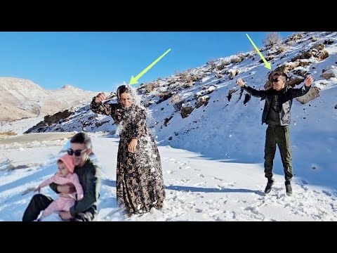 "The peak of romance: Ali and Sakineh's snowy mountain picnic" 🏔️😍☃️