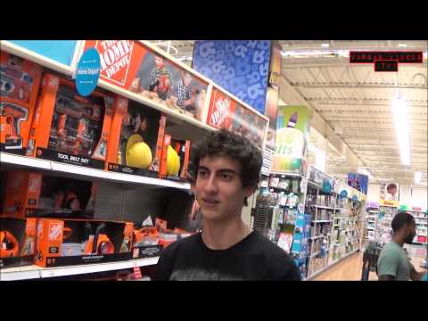 KID BUSTS HIS ASS ON A SKATEBOARD IN TOYS R US!