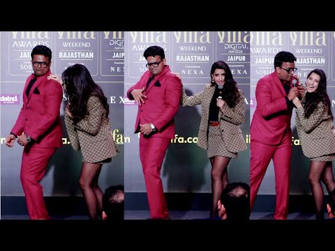 Nora Fatehi Teaching Host Siddharth Kannan Belly Dancing At IIFA Awards 2025 Press Conference