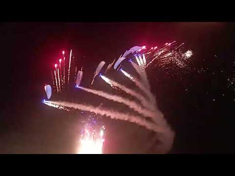 Unforgettable flights of paragliders during the fireworks at night. Bucharest Air Show