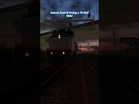 Amtrak Dash-8 towing a Tri-Rail DMU