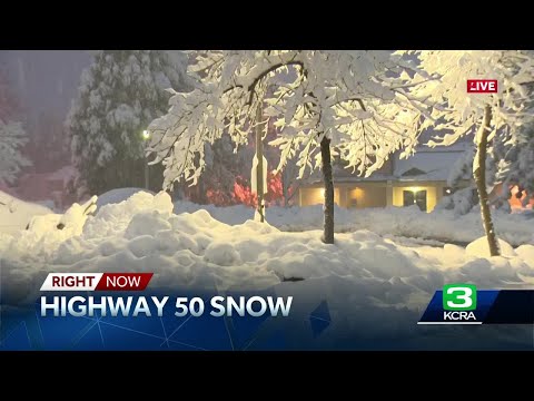 Snowplows clear blanketed California roads amid winter storm