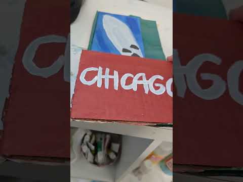 Nat (me) hot-glueing Chicago Band on cardboard