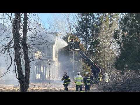 1 hospitalized as house, barn, vehicles go up in flames in Middleborough, Massachusetts