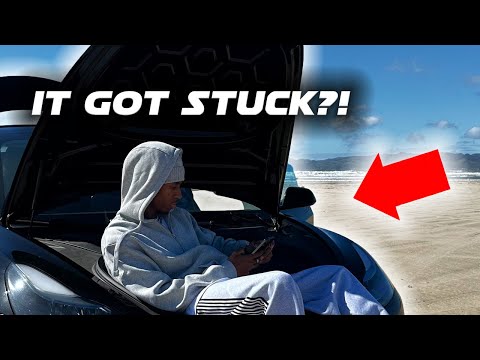 i drove my tesla on the beach & it got stuck..