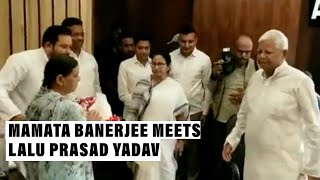 Watch: West Bengal CM Mamata Banerjee touches Lalu Prasad Yadav‘s feet ahead of Oppn meet