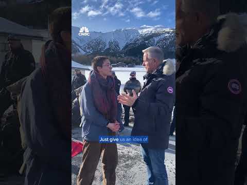 Protesters block the road to Davos