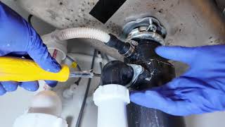 Check kitchen sink leak, the garbage disposal missing one bolt loose