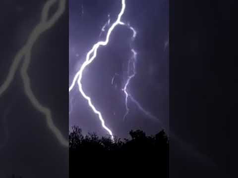 Lightning and thunder strike the Eiffel Tower in a wonderful scene