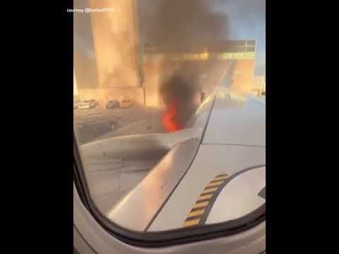 Plane engine captured on fire at Denver airport