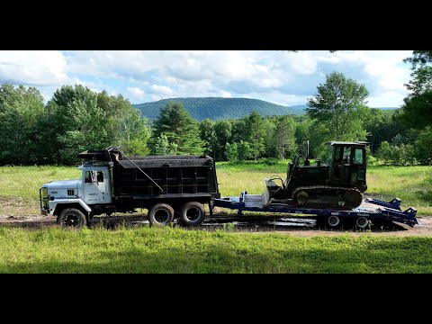 Moving a dozer and shipping container