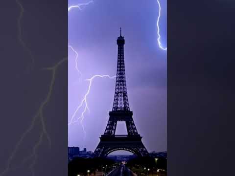 Lightning and thunder strike the Eiffel Tower in a wonderful scene