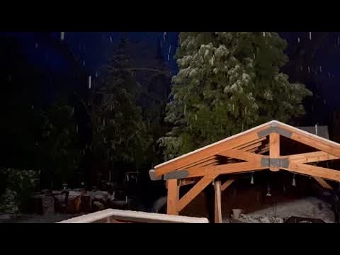 RAW | Snow falls in West Point, California