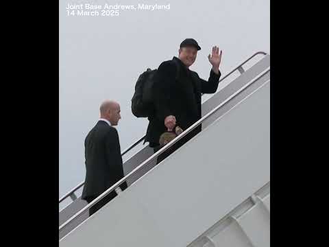 Elon Musk and son X boarding stairs of Air Force One