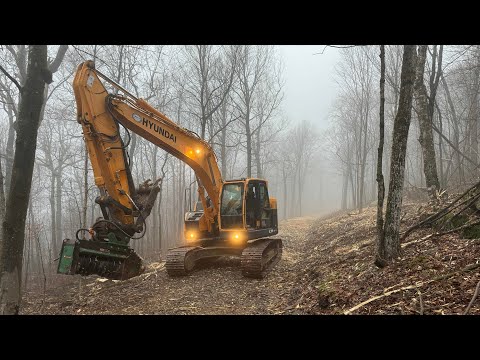 Setting up an excavator mulcher