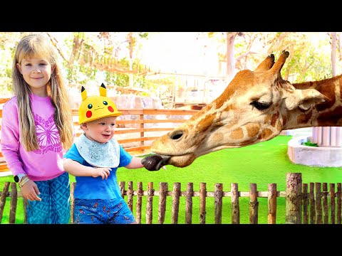 Diana Roma & Oliver feed the Animals at the Emirates Park Zoo