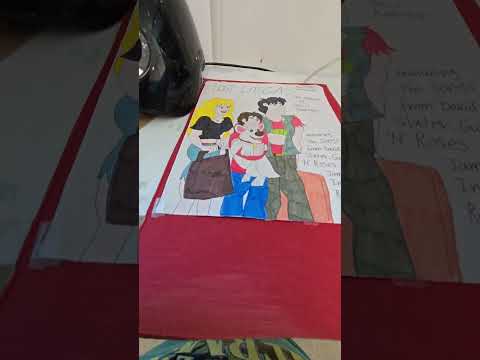 Nat (me) {off-screen} hot-glueing Dragon's Lair drawing on cardboard