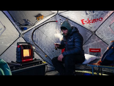 Winter Camping on the Ice in a fishing hut in freezing conditions