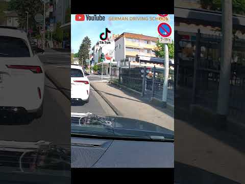 left turning car ignores the priority rule again - German Driving School