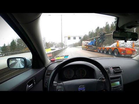 Volvo V50 Driving in the Rain to Södertälje