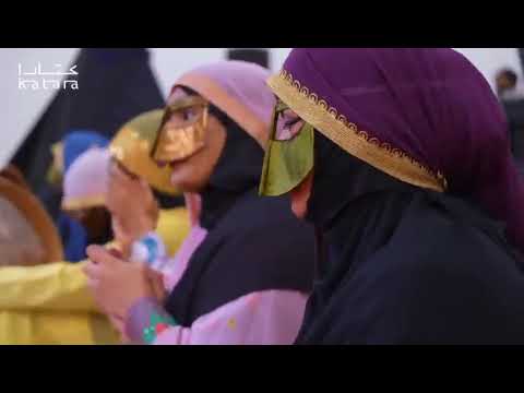 Qatari Folklore Women's Ensemble gives a performance at the Cultural Village Foundation EidAlFitr