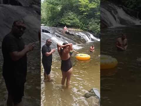 Z-Man sliding down Cashiers' Sliding Rock, NC