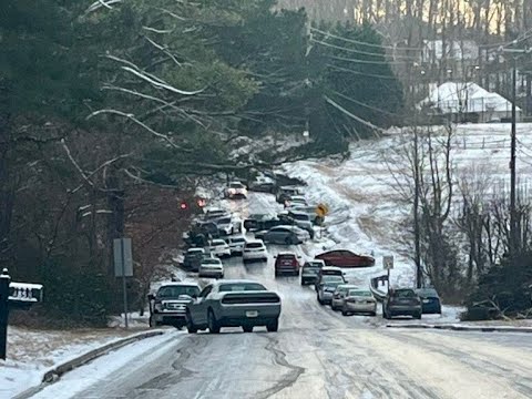 Neighbors whose vehicles were towed from icy roadways feel they were 'taken' by law enforcement