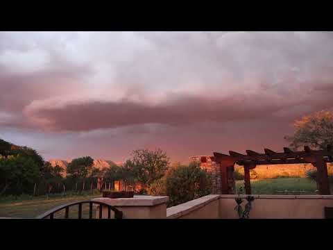 Red Tailed hawk and monsoon tilted version sunset August 23 2024