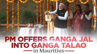 PM Modi offers Ganga Jal into Ganga Talao in Mauritius