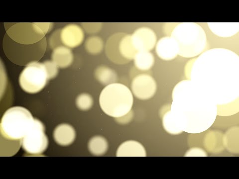 Flying Gold Dust Particles With Bokeh On A Dark Background Loop Animation | Free HD Version Footage