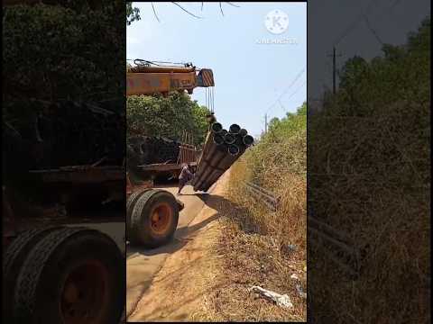 heavy unloading,crane,truck #heavy #unloading #crane #truck #pipes #shortsvideo #views #operator