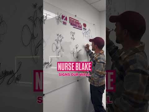 Nurse Blake Signs The Z100 Autograph Wall