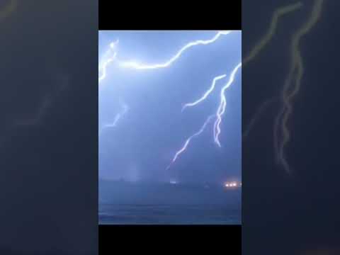 Rain and lightning falling in dark weather